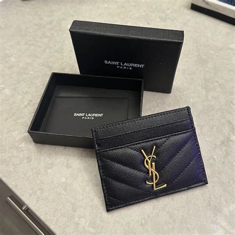 ysl card holder fake vs real|is ysl card holder real.